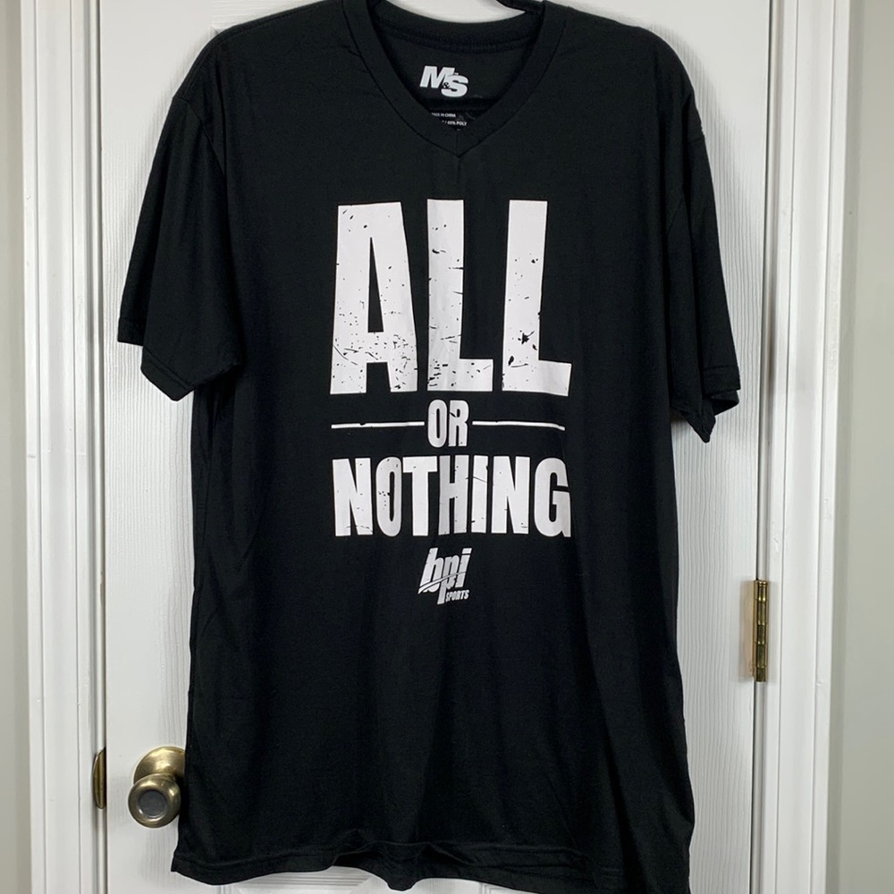 M&S black short sleeved tee shirt size XL. White lettering ALL or NOTHING